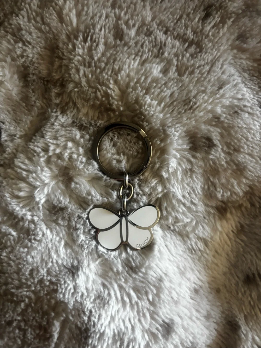 Coach White Enamel Butterfly Keychain with Silver Hardware